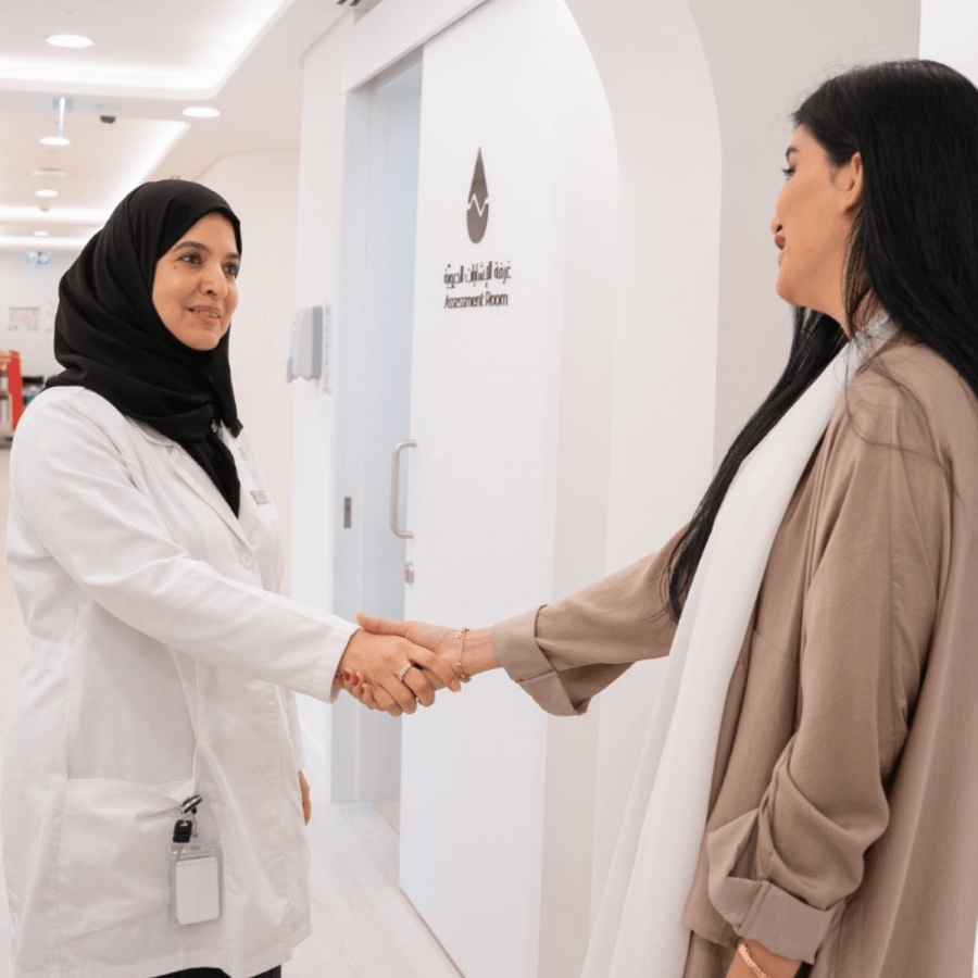 Dr. Khadija Al-Zaabi welcoming a patient at House of Skincare, Yas Island Abu Dhabi